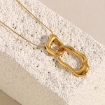 Ebbelle 18K banhado a ouro overlength irregular duplo círculo pingente colar de aço inoxidável suéter corrente joias femininas